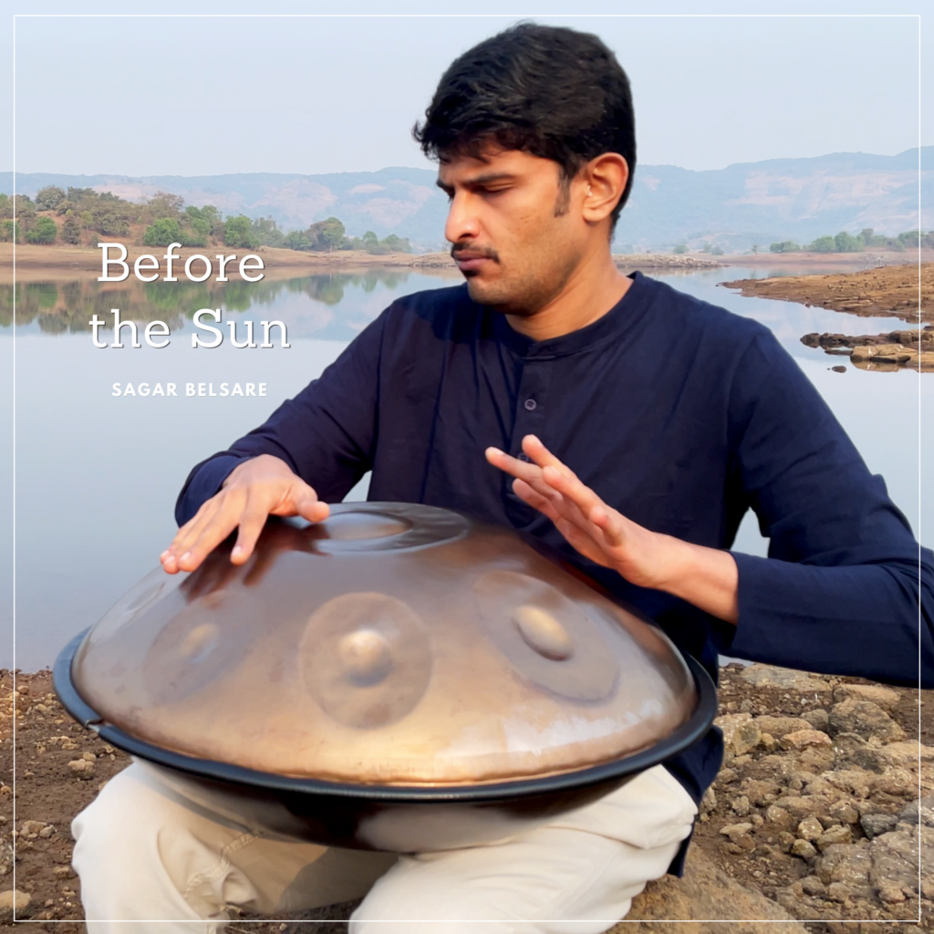 Close-up of Sagar Belsare playing handpan showing hand technique and instrument detail