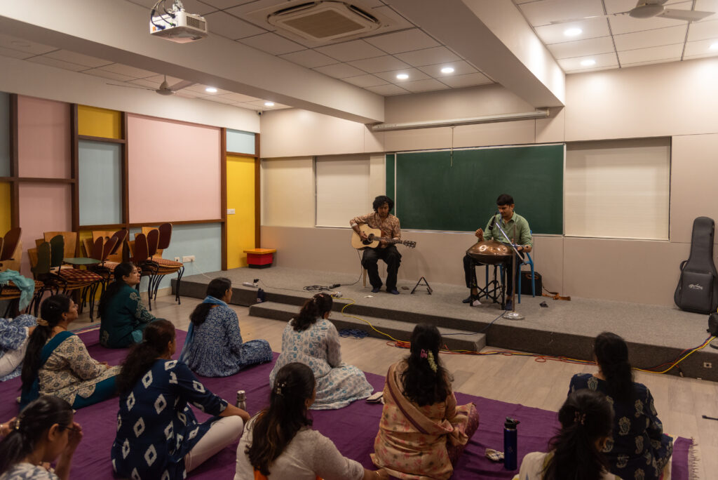 Handpan Echoes performing a live handpan and acoustic guitar concert at Dr. Kalmadi Shamarao Higher Secondary School, Pune.