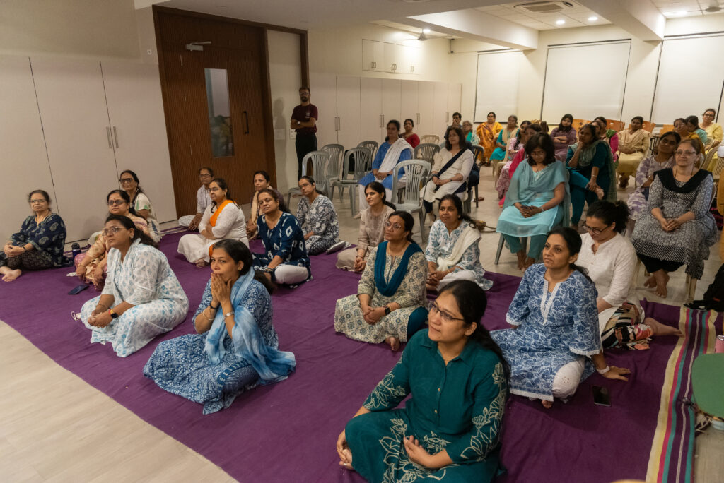 Faculty members enjoying a Handpan Echoes live instrumental music session in Pune.