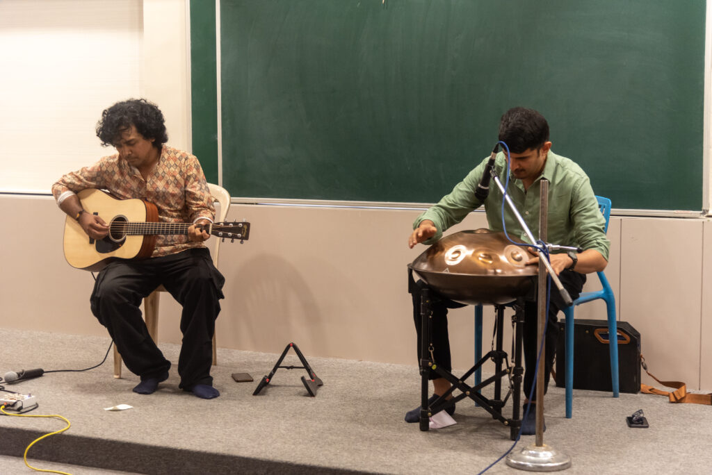 Sagar Belsare and Sanket Nashikkar performing handpan and acoustic guitar in Pune.