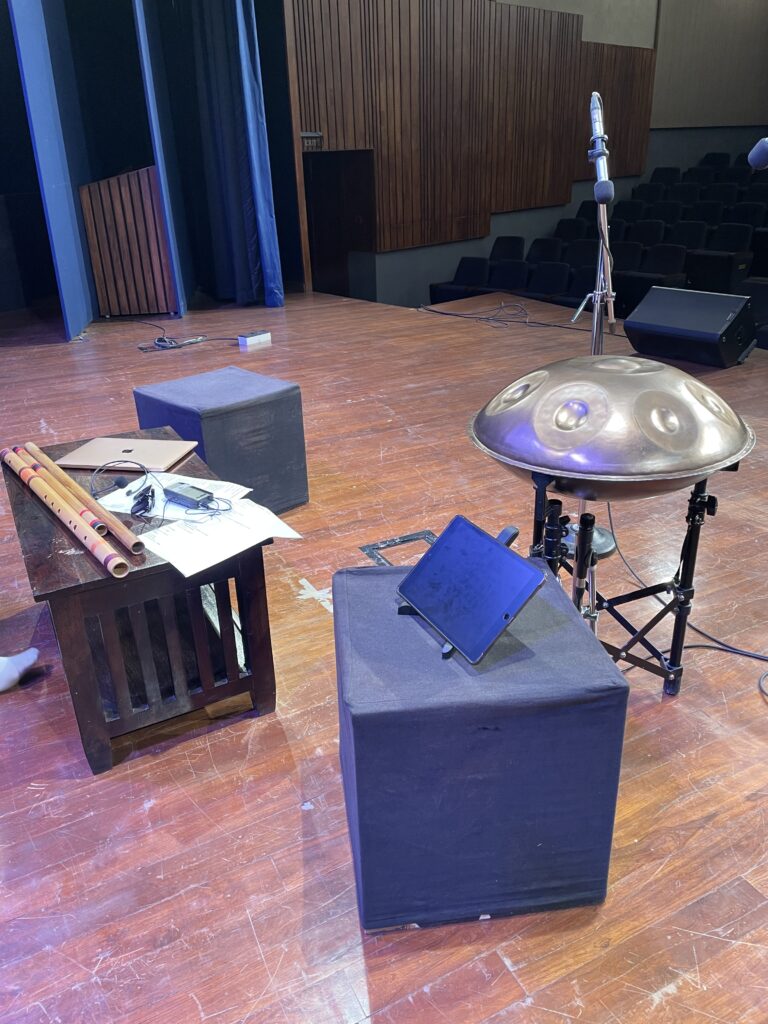 Handpan and flute stage setup before a live performance at Zapurza Pune
