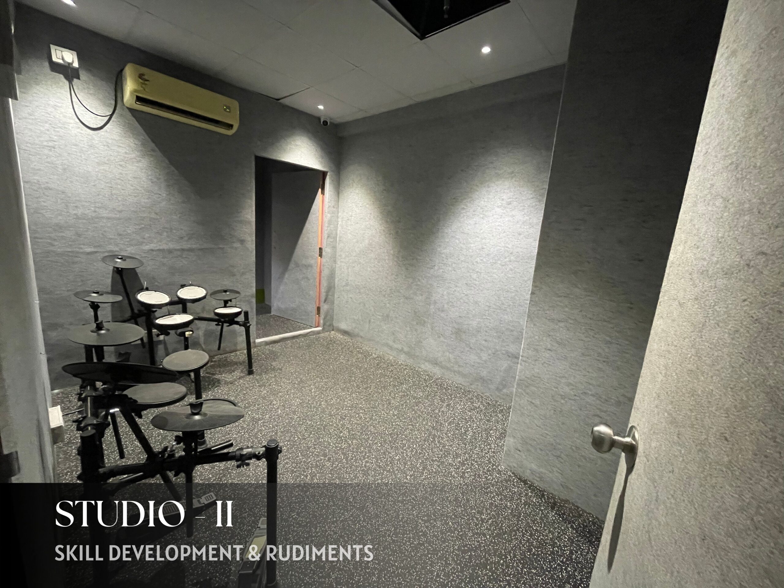 Dedicated drum lesson room at The Rhythm Story in Pimple Saudagar with professional instruments.