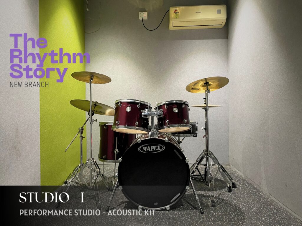 Drum classroom at The Rhythm Story's Pimple Saudagar branch inside Spot 18 Mall, featuring a professional acoustic drum kit and modern teaching environment.