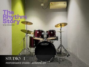 Drum classroom at The Rhythm Story's Pimple Saudagar branch inside Spot 18 Mall, featuring a professional acoustic drum kit and modern teaching environment.