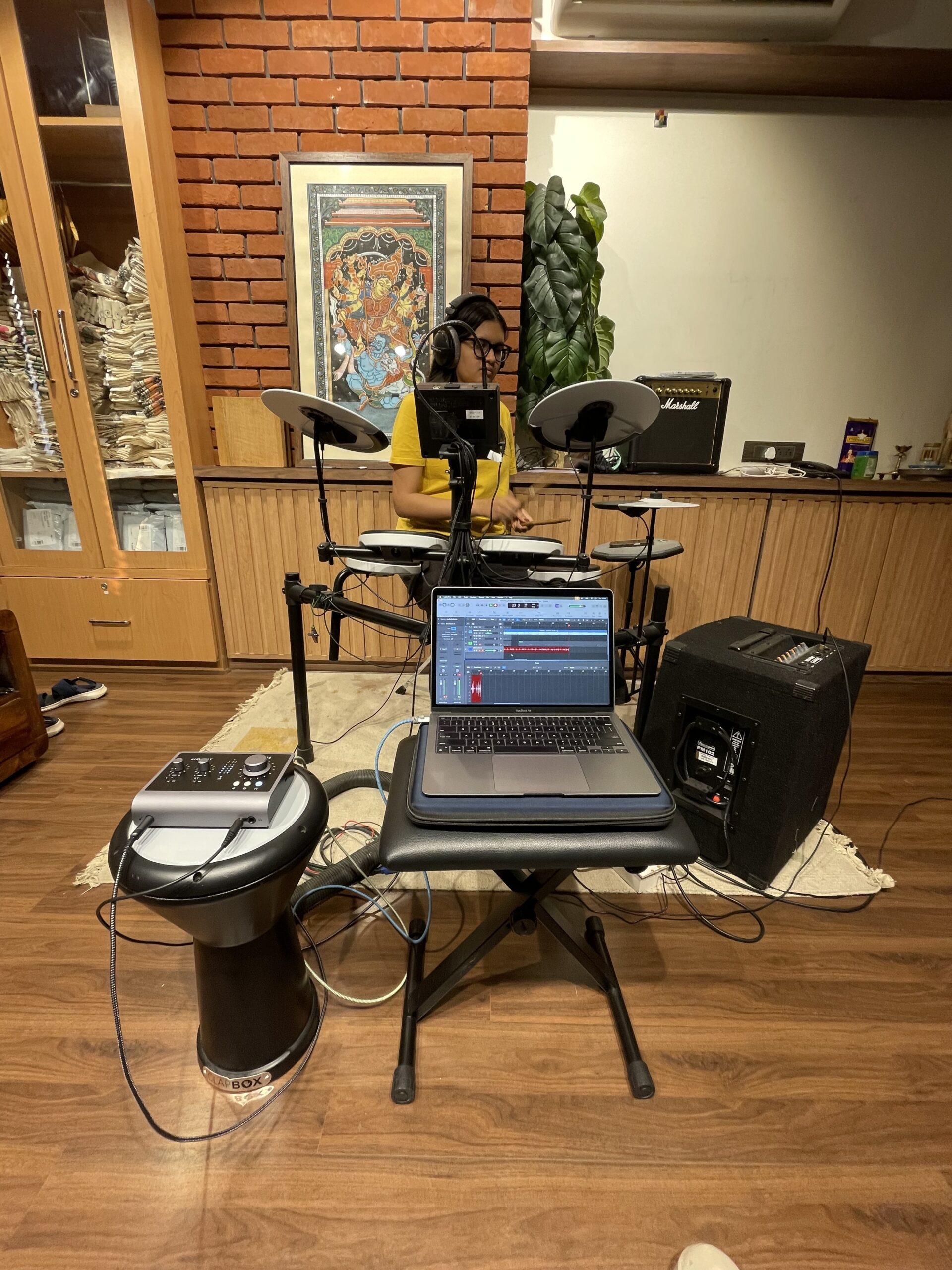 student-learning-drums-at-home-in-pune