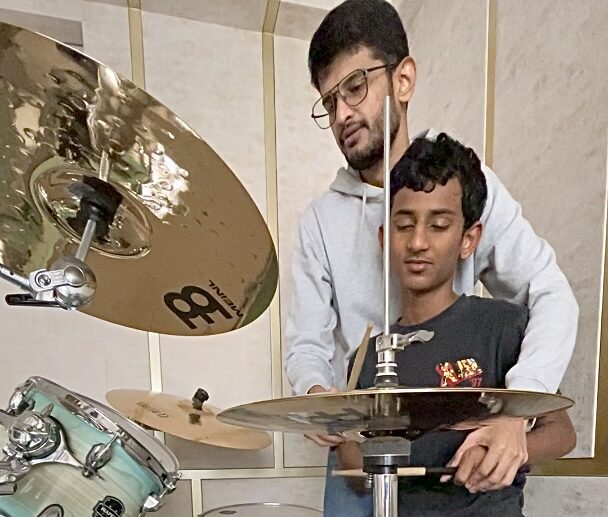 Sagar Belsare Drummer Pune teaching a student drums at The Rhythm Story Pune